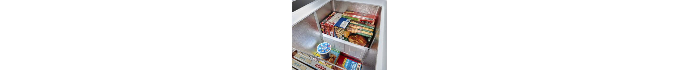 Frozen food inside of a chest freezer