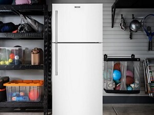 A Maytag® refrigerator in a garage