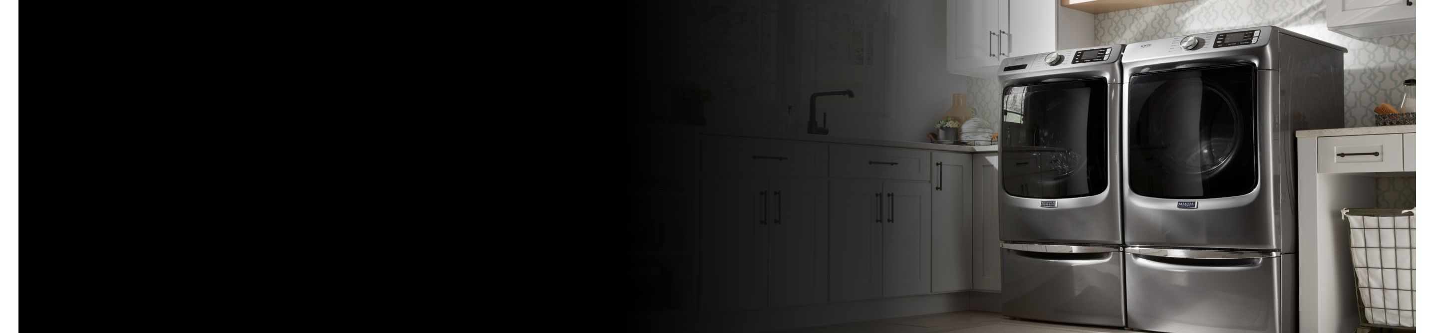 Maytag® dryer in a white laundry room