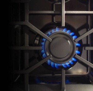 Bird’s-eye view of the blue flame of a gas burner 