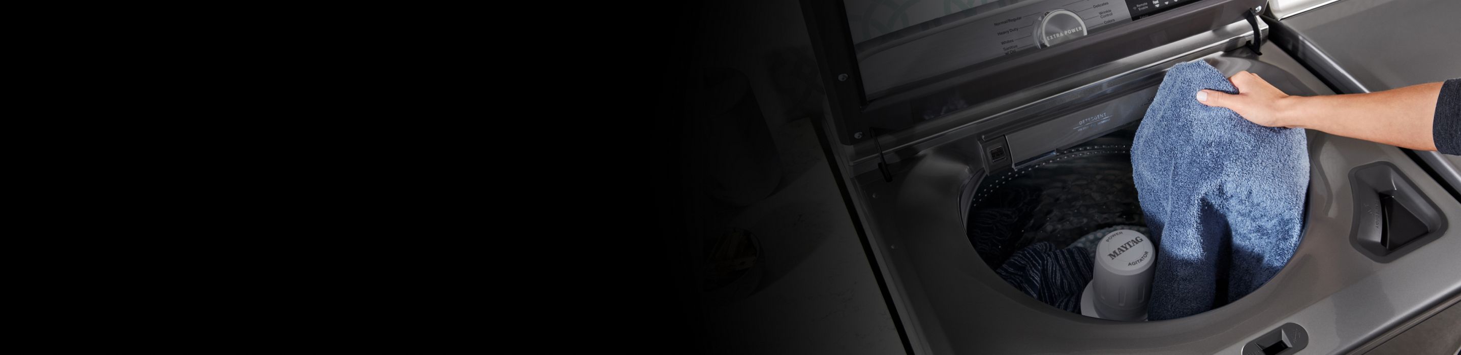 Maytag® top loading washing machine full of laundry