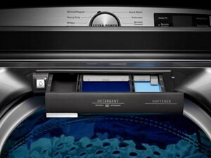 A closeup of a Maytag® washer detergent dispenser