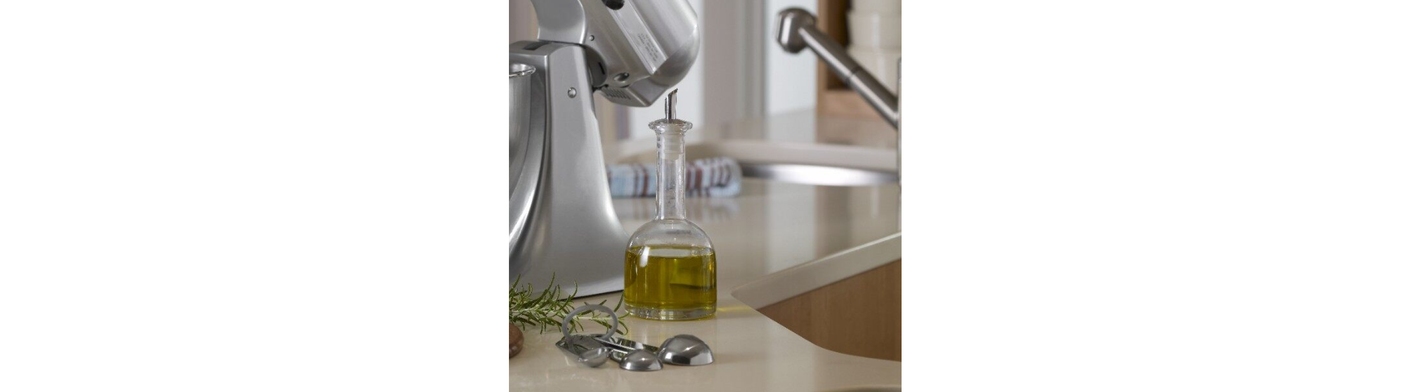 Bottle of olive oil resting on a countertop