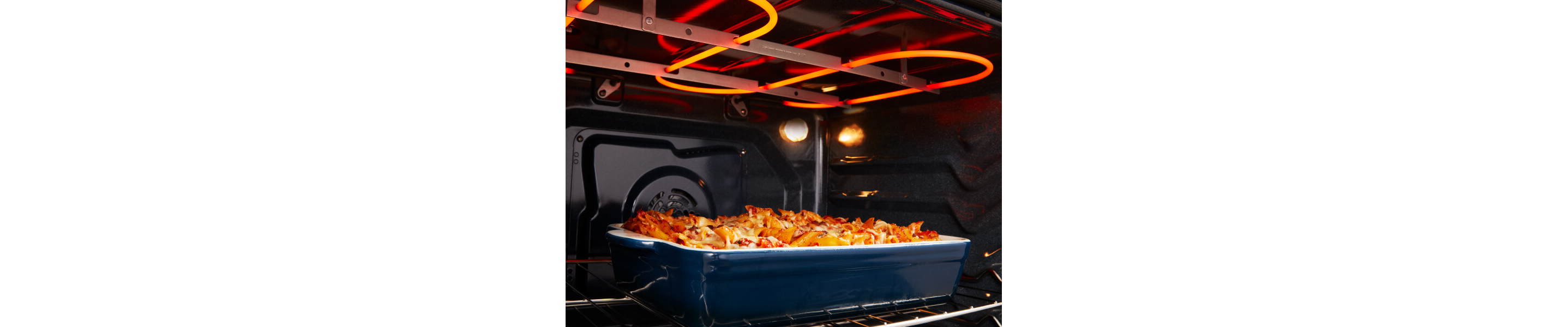 Pasta dish broiling inside the oven