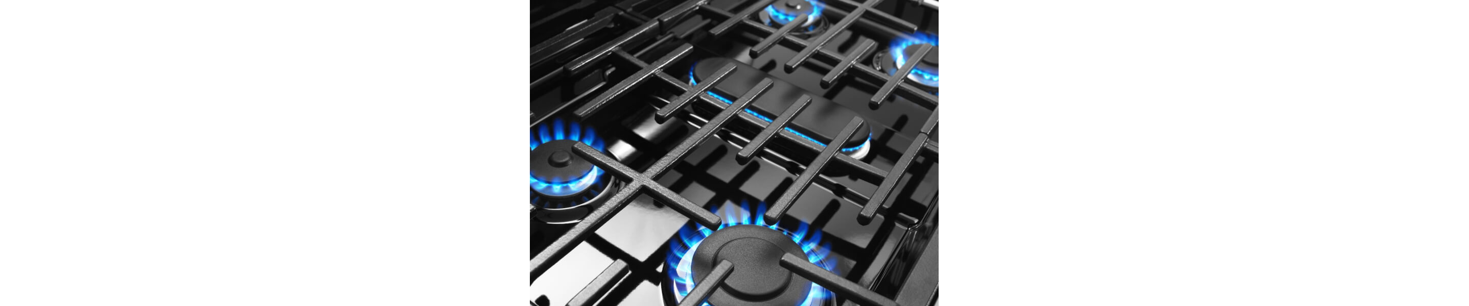Close-up of the blue flame of gas stovetop elements