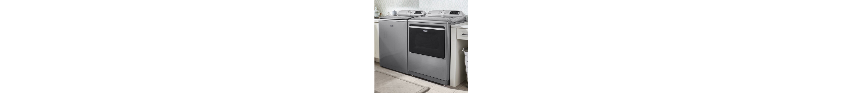 White washer and dryer pair in laundry room