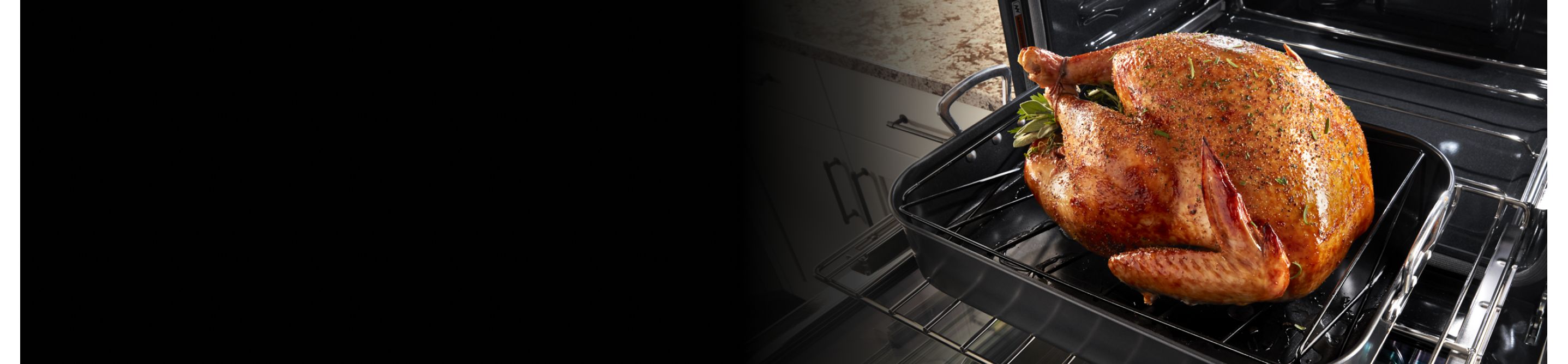 Roasted turkey on a roasting pan inside a Maytag® oven