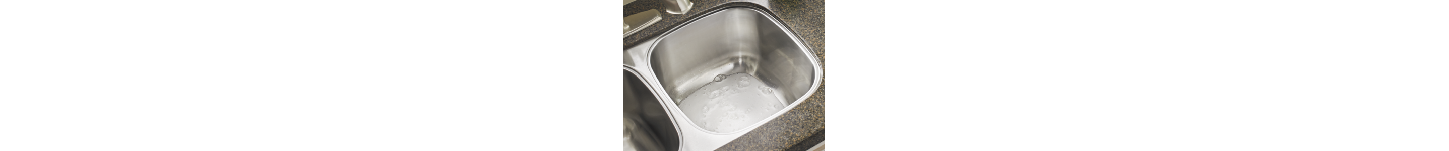 Kitchen sink with cleaner in it