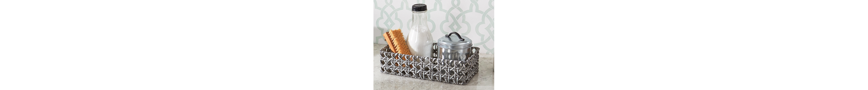 Basket of cleaning ingredients on counter