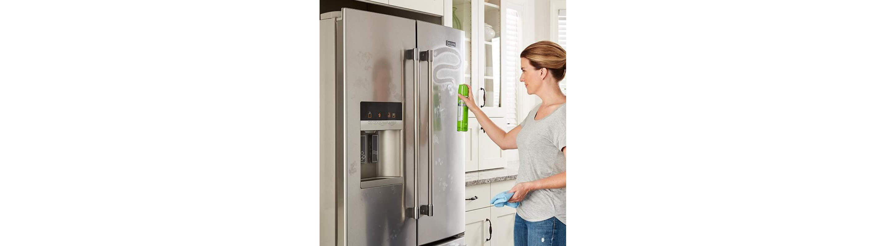 Person cleaning stainless steel with affresh® cleaner