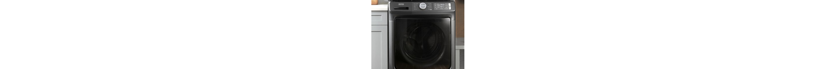 Front load dryer in a laundry room