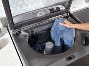 Lg top load washing shop machine leaking from bottom front
