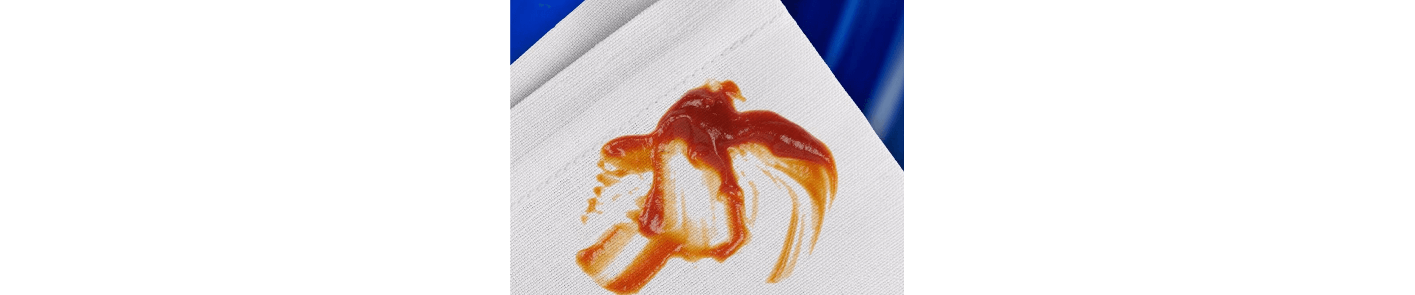Ketchup stain on white canvas fabric