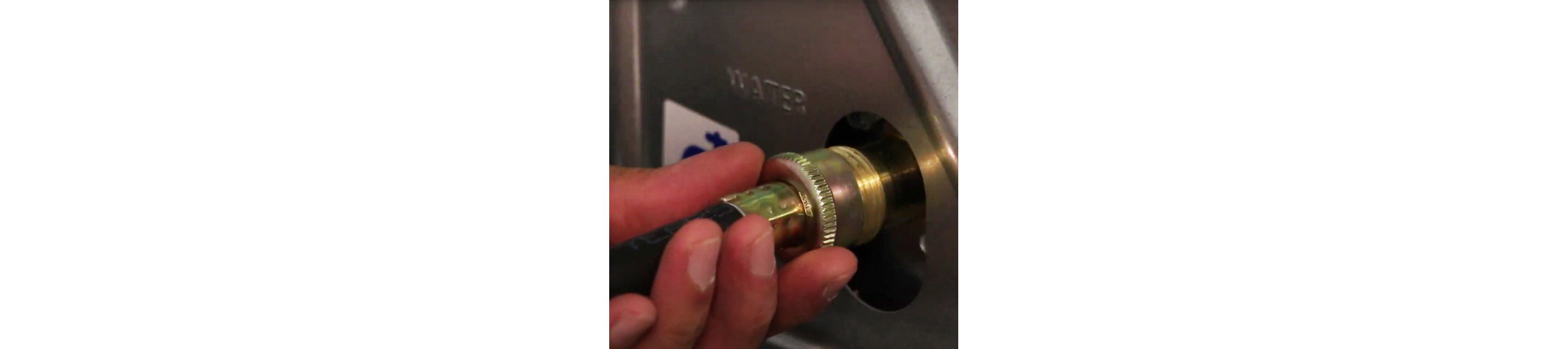 The water inlet hose is attached to a steam dryer