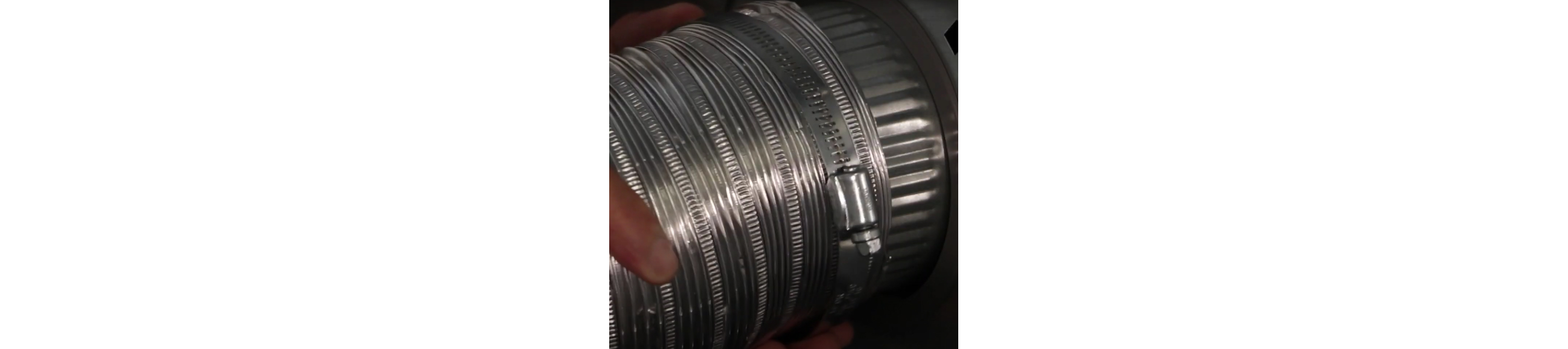The vent exhaust is secured to a dryer