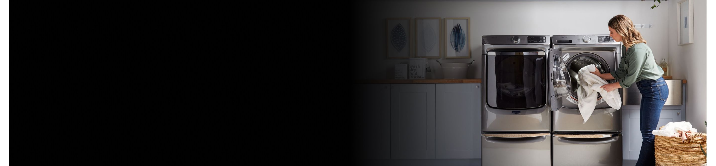 Person putting sheets in a Maytag® dryer