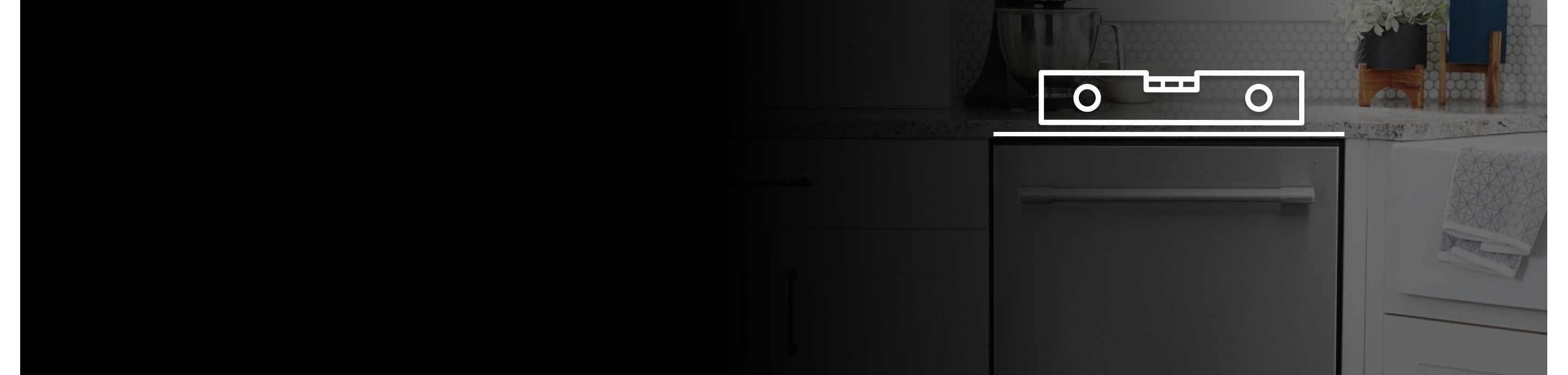 Maytag® dishwasher in a kitchen with a level on top. 