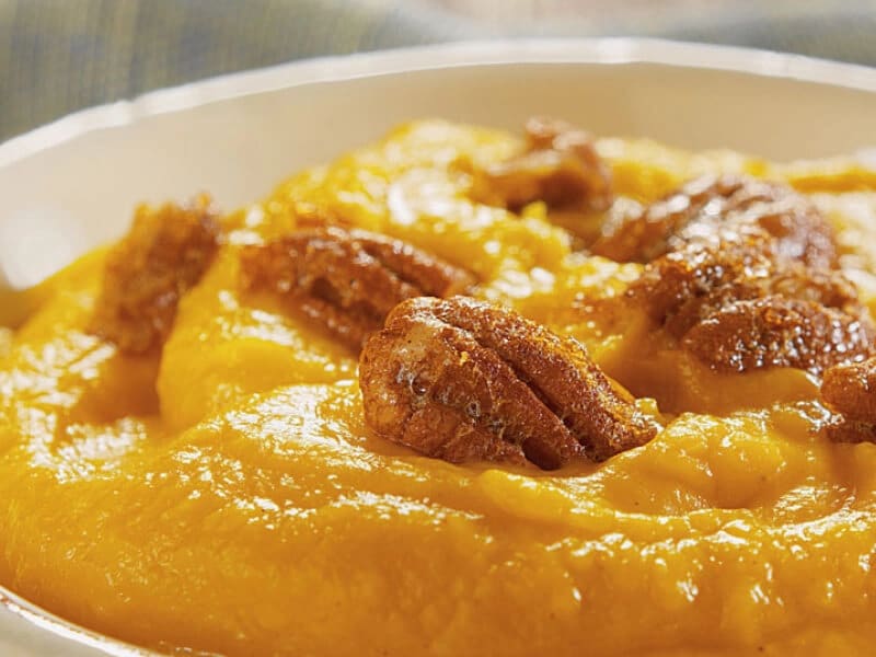 Pureed butternut squash topped with pecans
