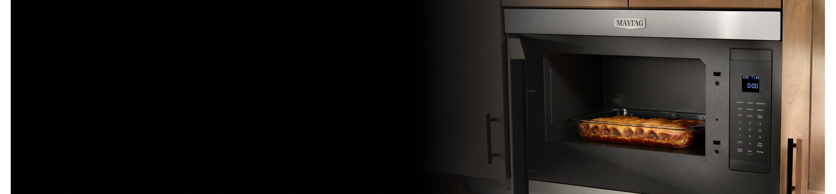 A closeup of a casserole in a Maytag® microwave