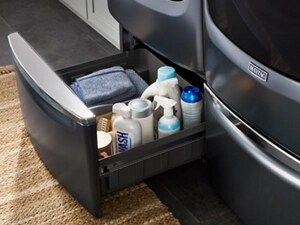  Laundry and cleaning supplies in pedestal below washer
