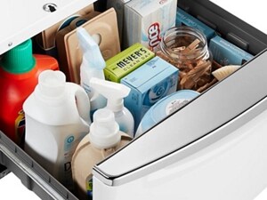 Laundry pedestal filled with laundry supplies