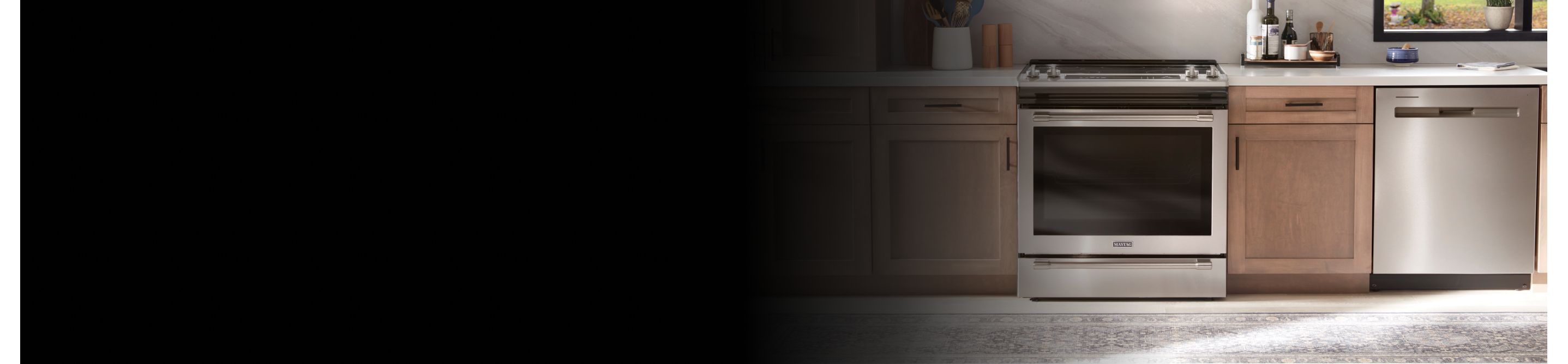 A Maytag® electric range in a modern kitchen