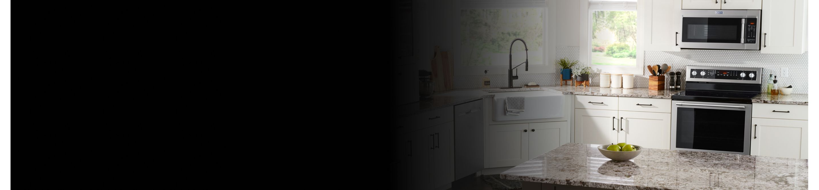 View of modern kitchen with Maytag brand appliances