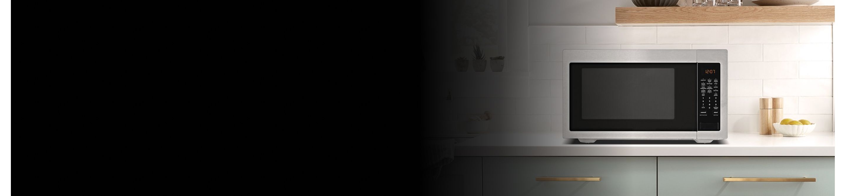Stainless steel microwave on a countertop