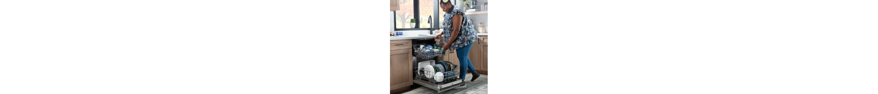 Person loading a dishwasher
