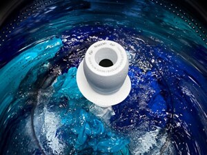 A closeup image of clothing washing in a washer