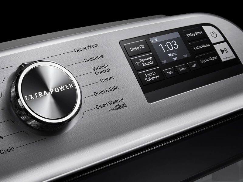 Extra Power button on a washing machine control panel