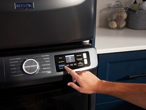 Person pressing Pet Pro button on washer 