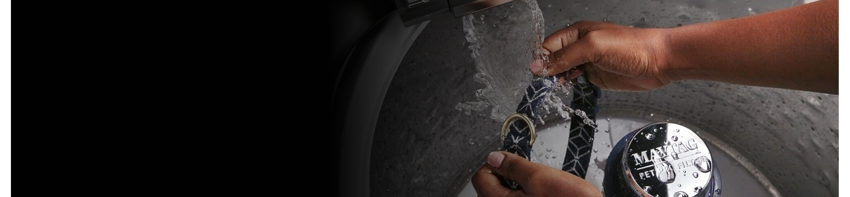 Hands rinsing a collar under water