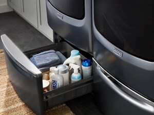 Laundry detergent in a laundry pedestal drawer