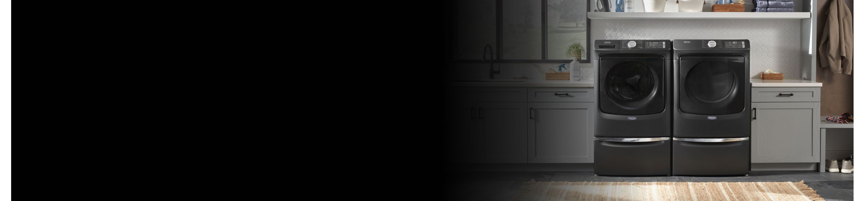 Laundry room featuring Maytag® washer and dryer