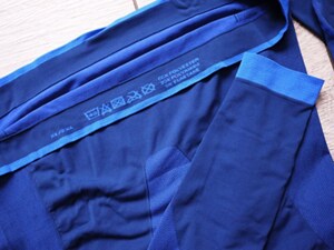 The care label on a pair of blue leggings