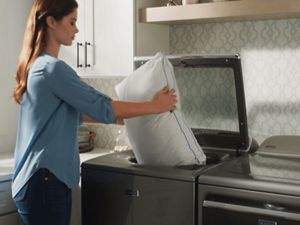 Putting pillows in the washer discount