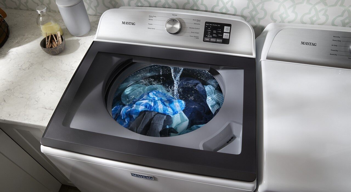 Can you wash a down jacket in a top load top washer
