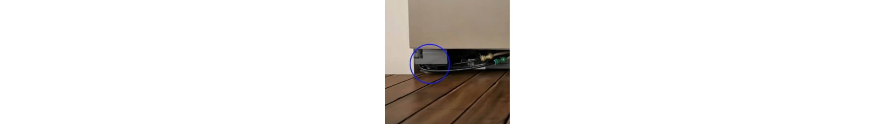 Close-up of leveling legs circled on one side of the refrigerator