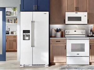A modern kitchen with white Maytag® appliances