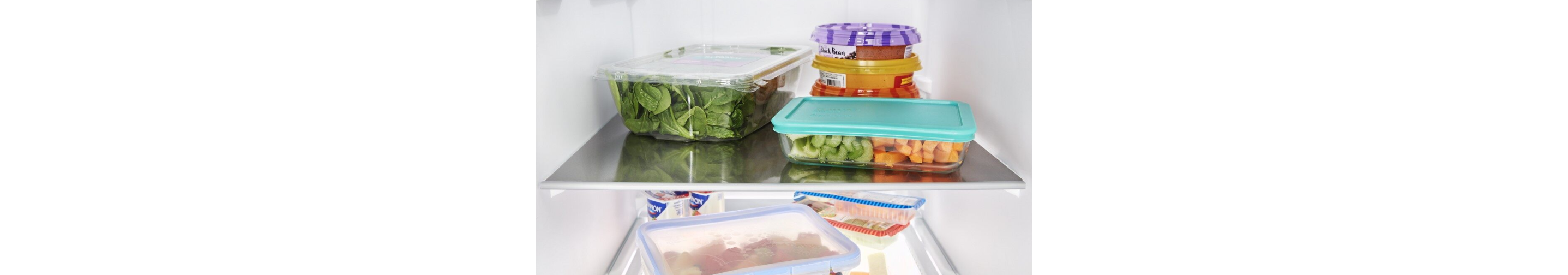 Food stocked on refrigerator shelves