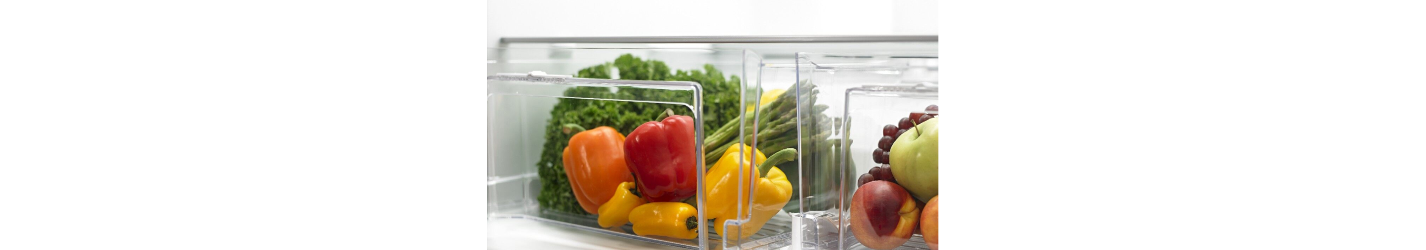 Vegetables and fruits stored in fridge bins