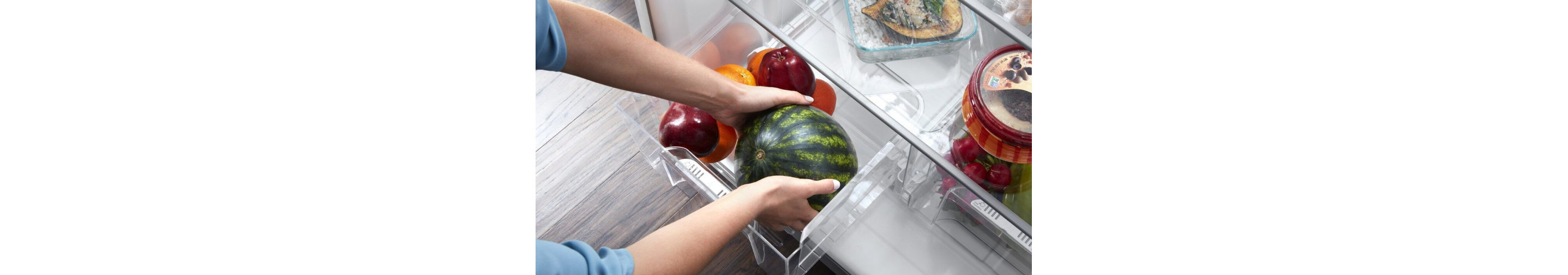 Removing a watermelon from a humidity drawer