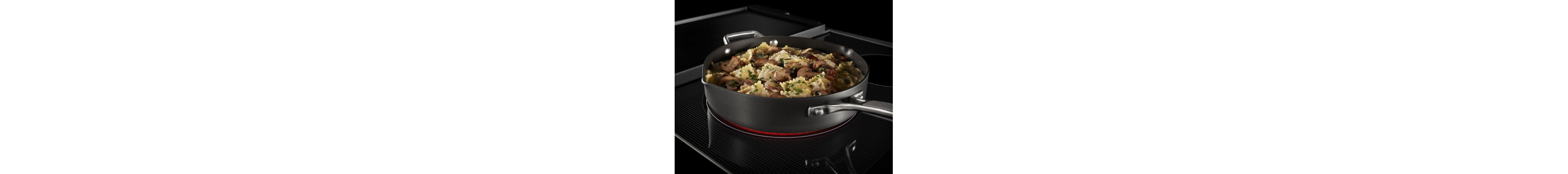 Pan full of ravioli cooking on the stovetop