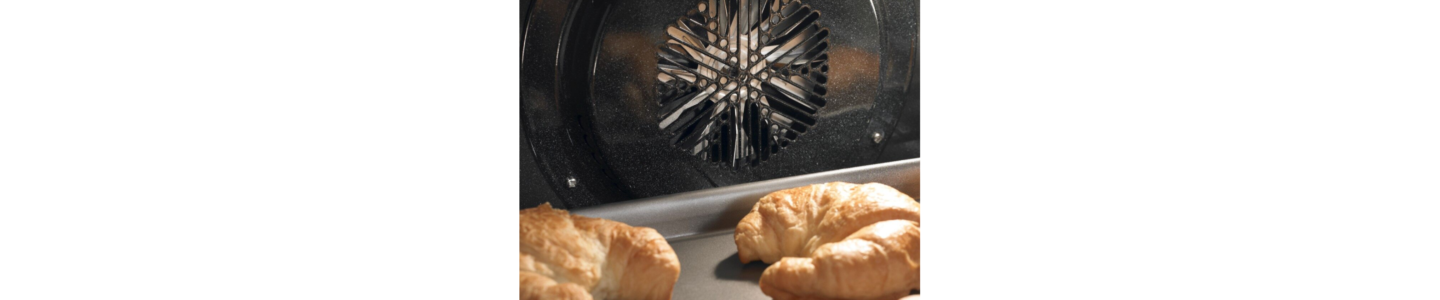 Croissants baking in convection oven