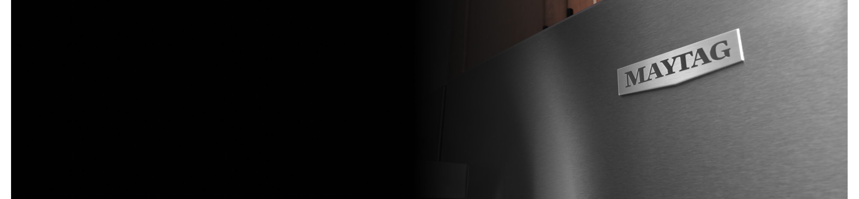 The front of a stainless steel Maytag® refrigerator