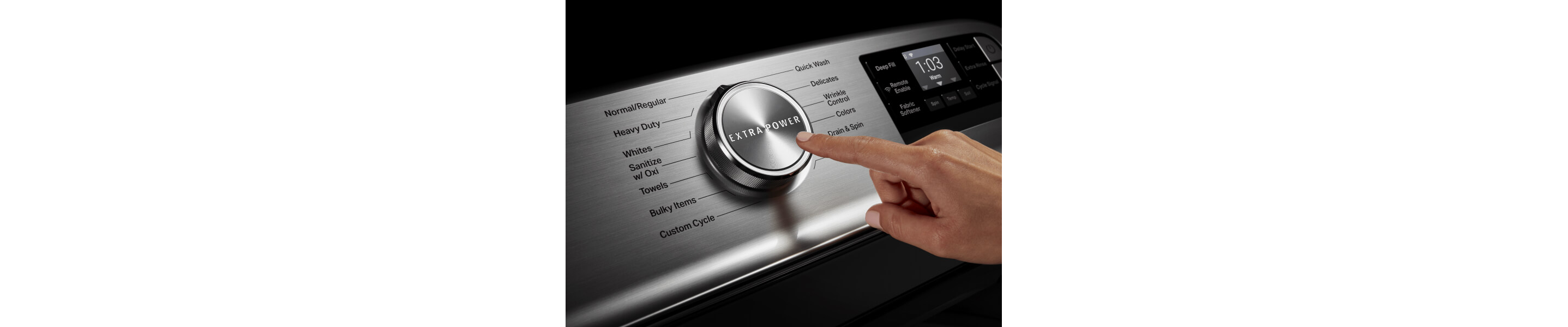 Person selecting Extra Power on a Maytag brand washer