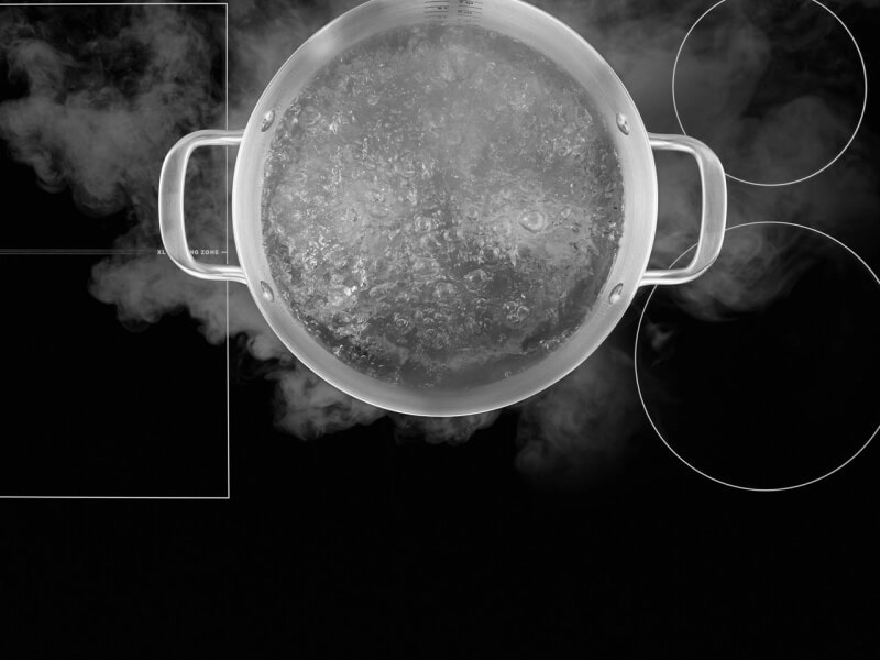 Water boiling in a pot on an induction cooktop