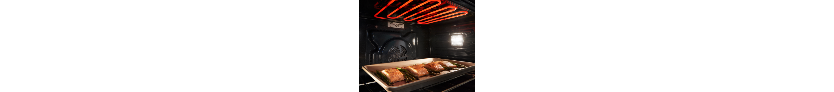 Fish cooking in an oven
