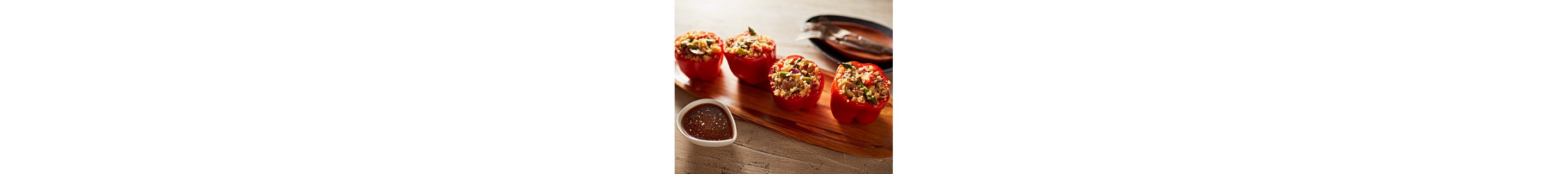 Stuffed bell peppers on a cutting board